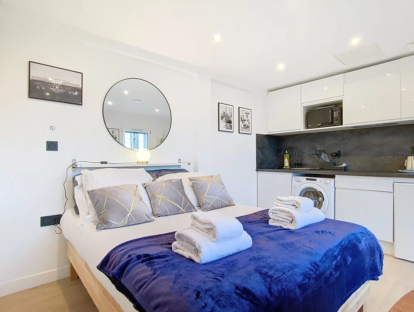 appartement meuble touristique argenteuil tout equipe Studio moderne avec lit, cuisine équipée.